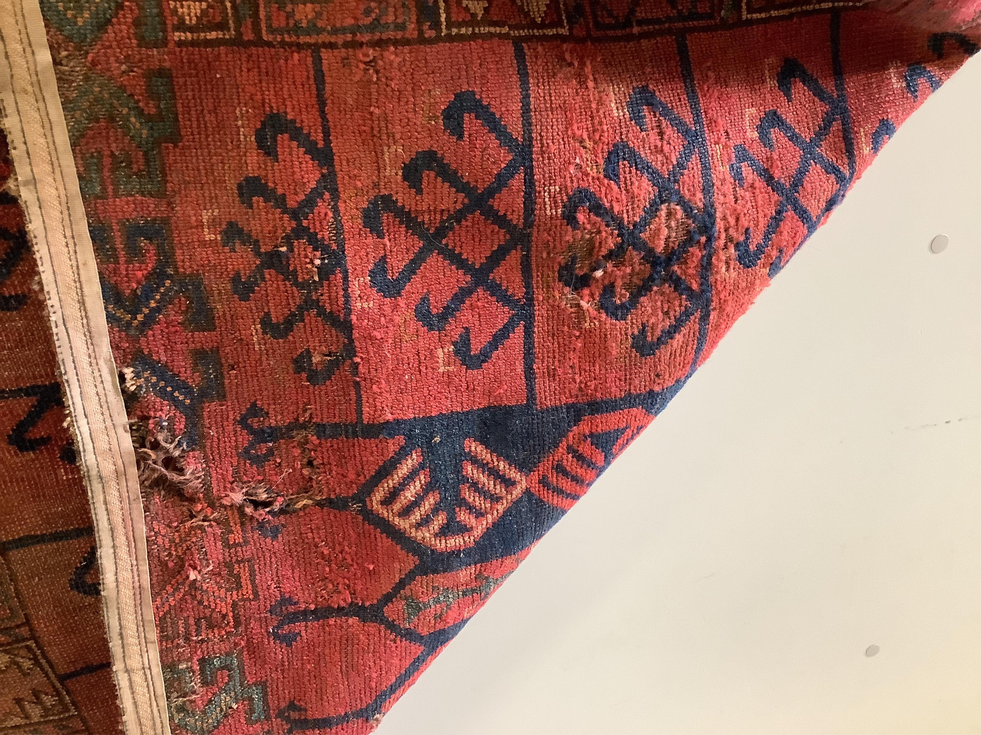 A near pair of antique Turkomen rugs, larger 180 x 134cm. Condition - fair